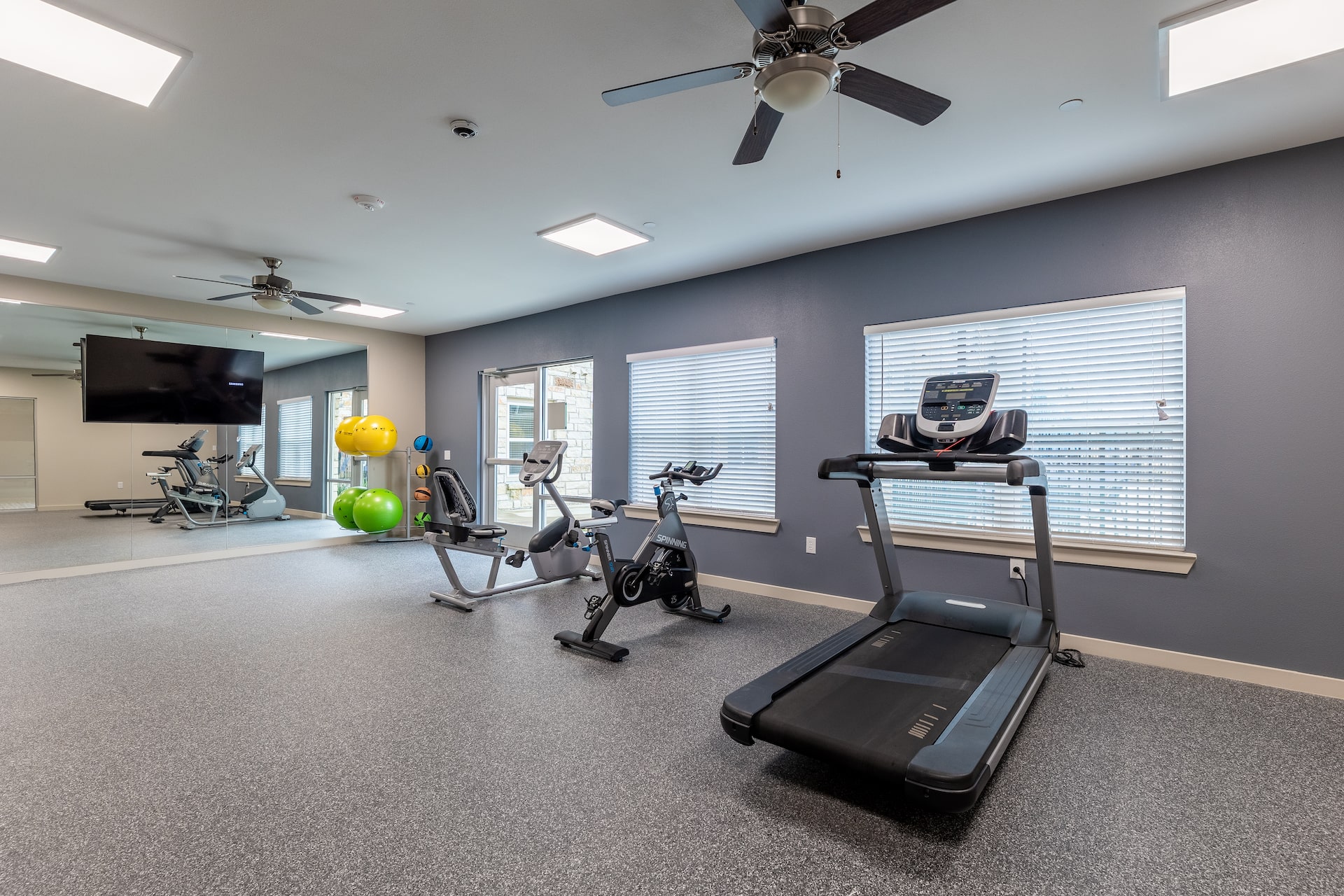 Cardio equipment in the state-of-the-art fitness center for residents of our Manor, TX apartments